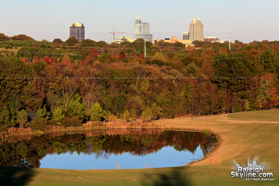 Raleigh peeks over the autumn colors from Lonnie Poole Golf Course