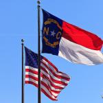 State flag of North Carolina with American flag