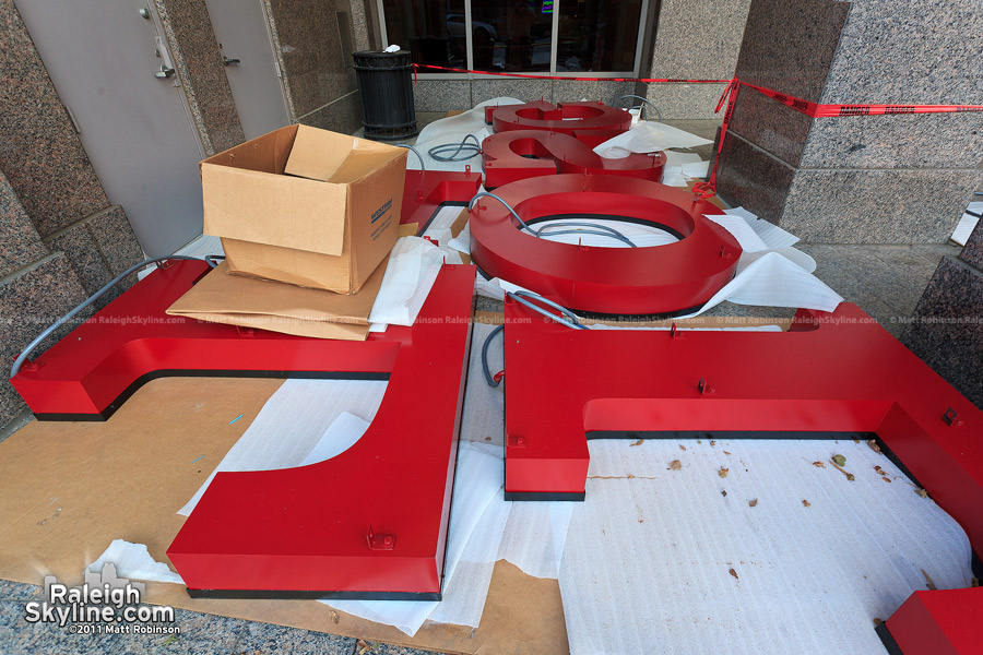 Wells Fargo letters rest at ground level near the lobby