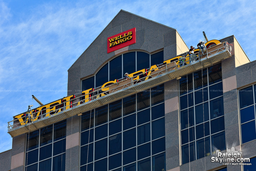 Ground level view of the stage scaffolding for the Wells Fargo sign