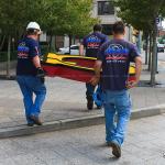 Signage workers carry a letter "G" for placement atop Raleigh's Skyline in Wells Fargo