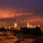 Orange and Purple sunset over Raleigh Skyline