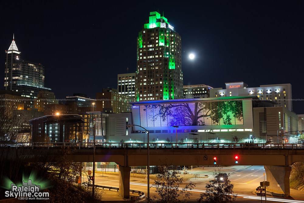 Full moon and Jupiter over the Raleigh skyline