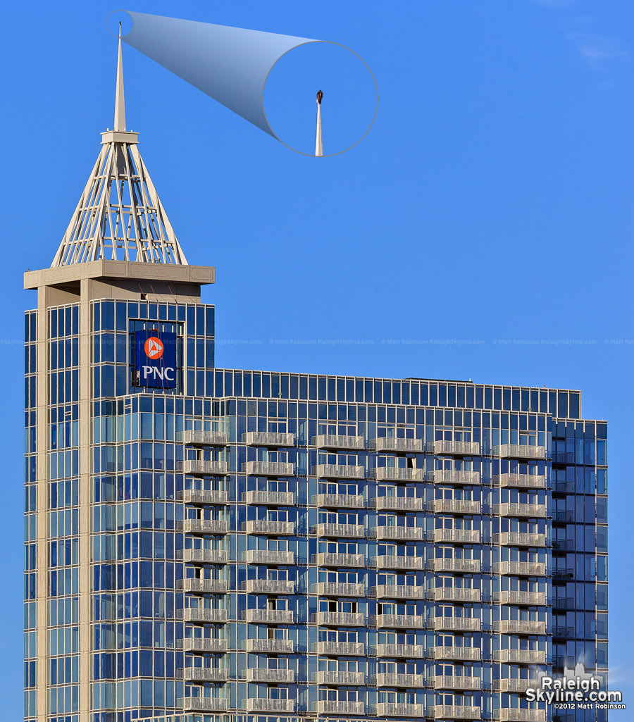 PNC Bank sign is installed as a red-tailed hawk sits 538 feet above downtown Raleigh