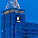 PNC Bank sign lit up at night in Raleigh