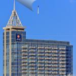 PNC Bank sign is installed as a red-tailed hawk sits 538 feet above downtown Raleigh