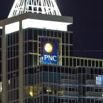 Work continues at night on the PNC sign