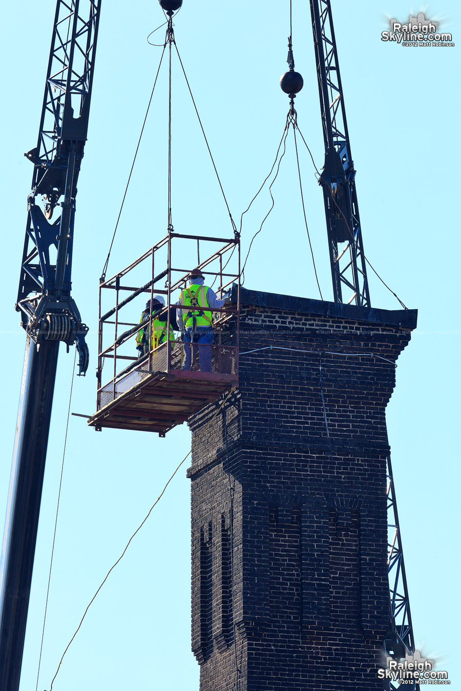 Fixing the tornado damaged Caraleigh Mills smokestack cap