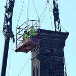 Fixing the tornado damaged Caraleigh Mills smokestack cap