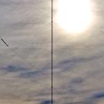 A welder clings to a new radio tower in Raleigh