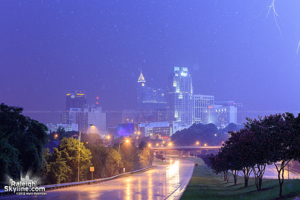 Downtown Raleigh watches as lightning strikes off camera