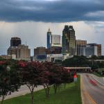 Approaching gust front over downtown with lightning