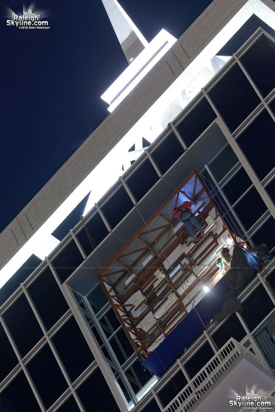 Installation work for the PNC Sign on the north face of RBC Plaza