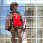 Sir Walter Raleigh sports a NC State Basketball jersey