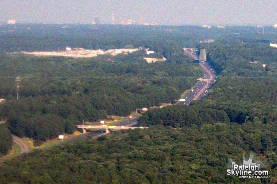 Weekend move of the SunTrust Tower to downtown Raleigh seen from incoming airplane over Interstate 40