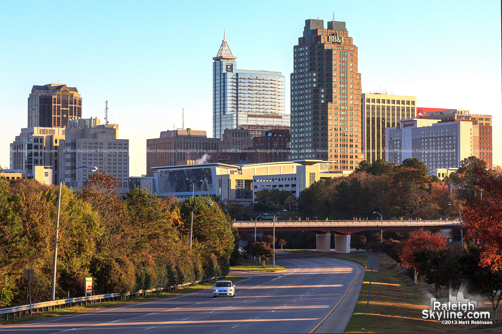 Fall morning skyline with Raleigh marathon runners