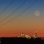  Comet Panstarrs (upper left) with the crescent moon and the Raleigh Skyline