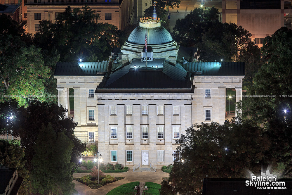 Nighttime view of the North Carolina State capital at night from PNC Plaza