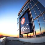 PNC sign atop PNC Plaza from roof at sunset