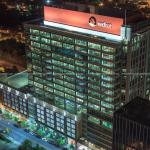 Red Hat Tower at night from PNC Plaza roof