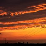 Layered sunset over distant Raleigh skyline silhouette - August 13, 2009