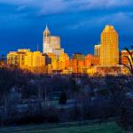 Shadows consume all but the brightly lit buildings of downtown Raleigh - February 3, 2013