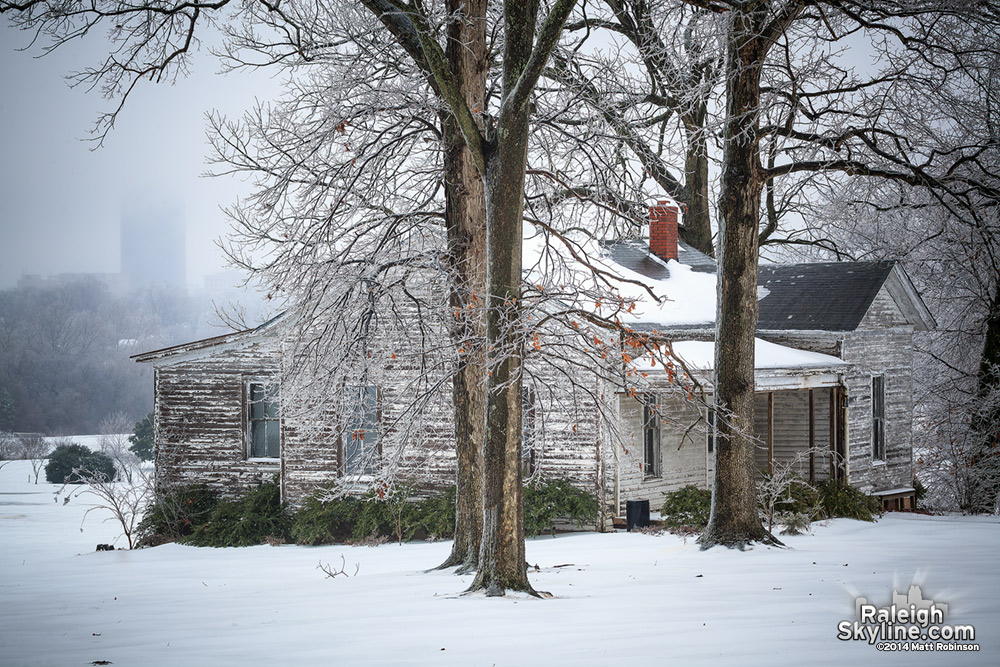 Old House on Dorothea Dix campus in the snow and ice