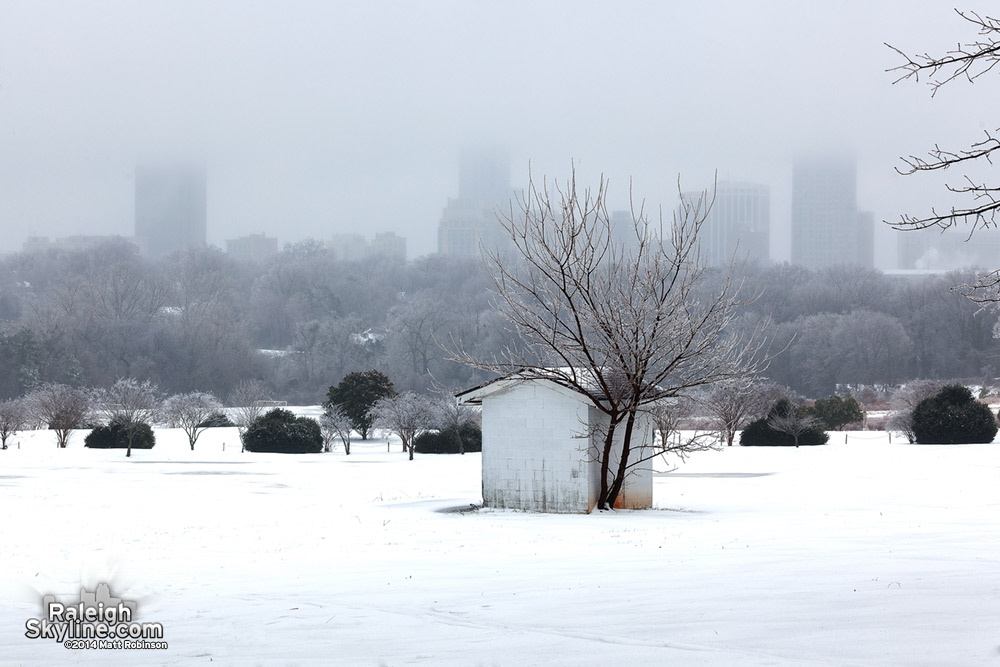 Downtown Raleigh fades into the sky with snow and ice