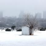 Downtown Raleigh fades into the sky with snow and ice