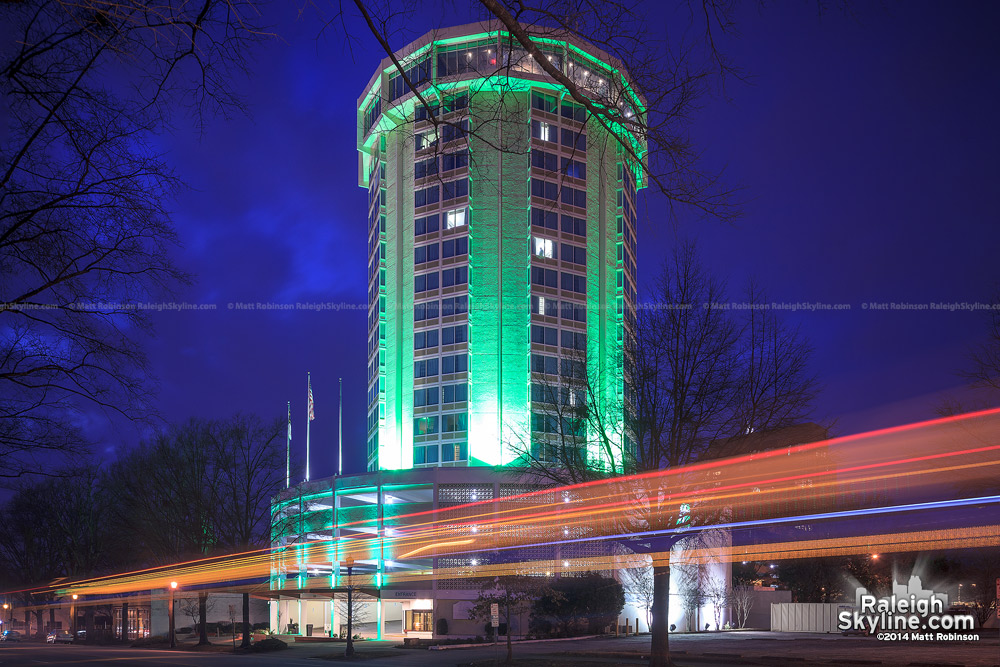 Green lighting on the renovated circular Holiday Inn in Raleigh