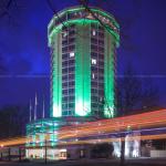 Green lighting on the renovated circular Holiday Inn in Raleigh