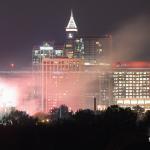 Smoke and fire smoldered into the night after the implosion of the BB&amp;T Building