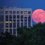 Supermoon rises next to Duke One Progress Plaza