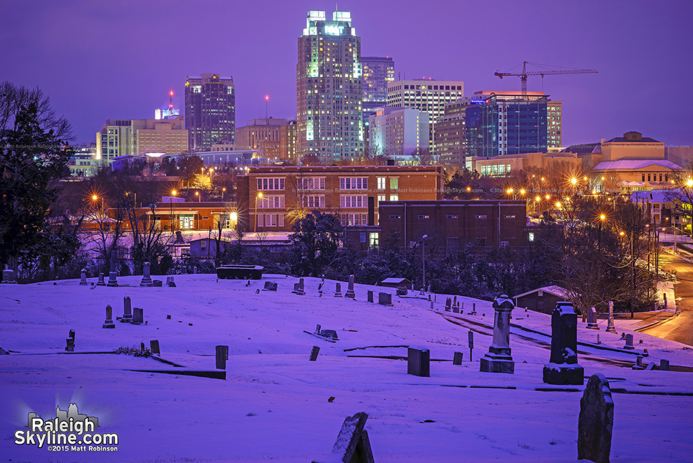 Mount Hope Snow cover at night with Raleigh skyline