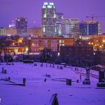 Mount Hope Snow cover at night with Raleigh skyline