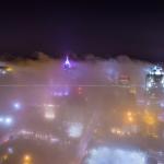 Raleigh buildings rise above fog at night