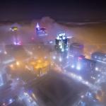 Raleigh North Carolina at night with fog enshrouding the city