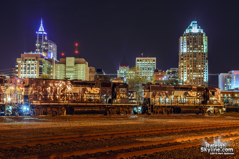 Raleigh Skyline at night with train