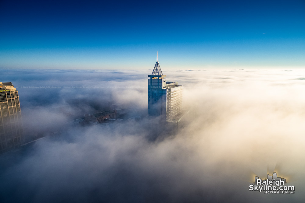 PNC Plaza in downtown Raleigh in the clouds