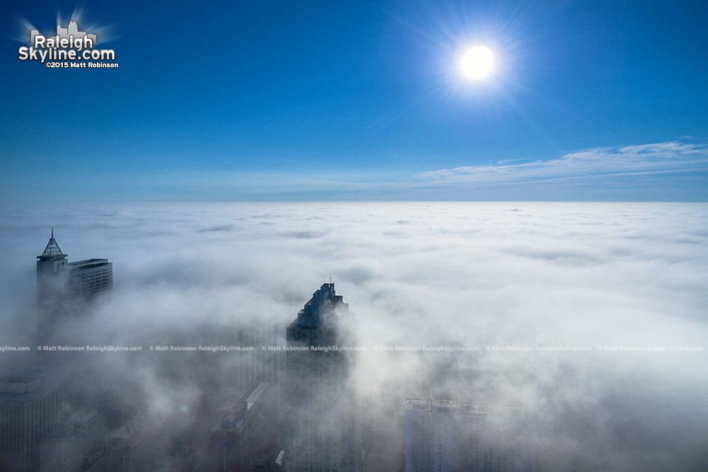 Downtown Raleigh pokes out of fog cover