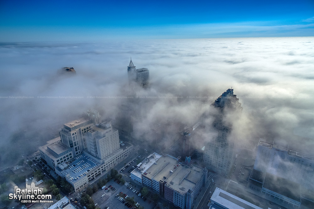Aerial of fog blanketing downtown Raleigh