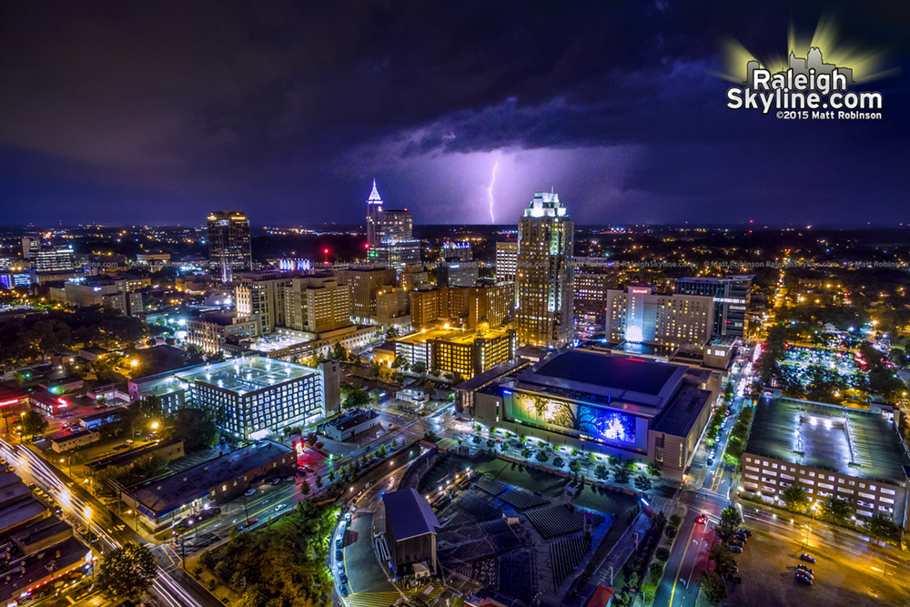 Night time aerial over downtown Raleigh with lightning strike
