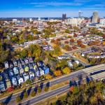 Colorful houses of Dorothea Gardens and downtown Raleigh