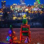 Little elf in the city looking at downtown Raleigh