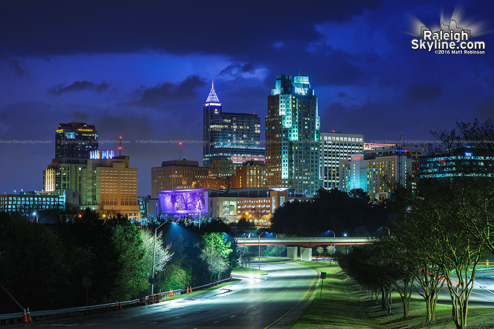 Lightning illuminates the clouds behind the Raleigh skyline from early spring storms