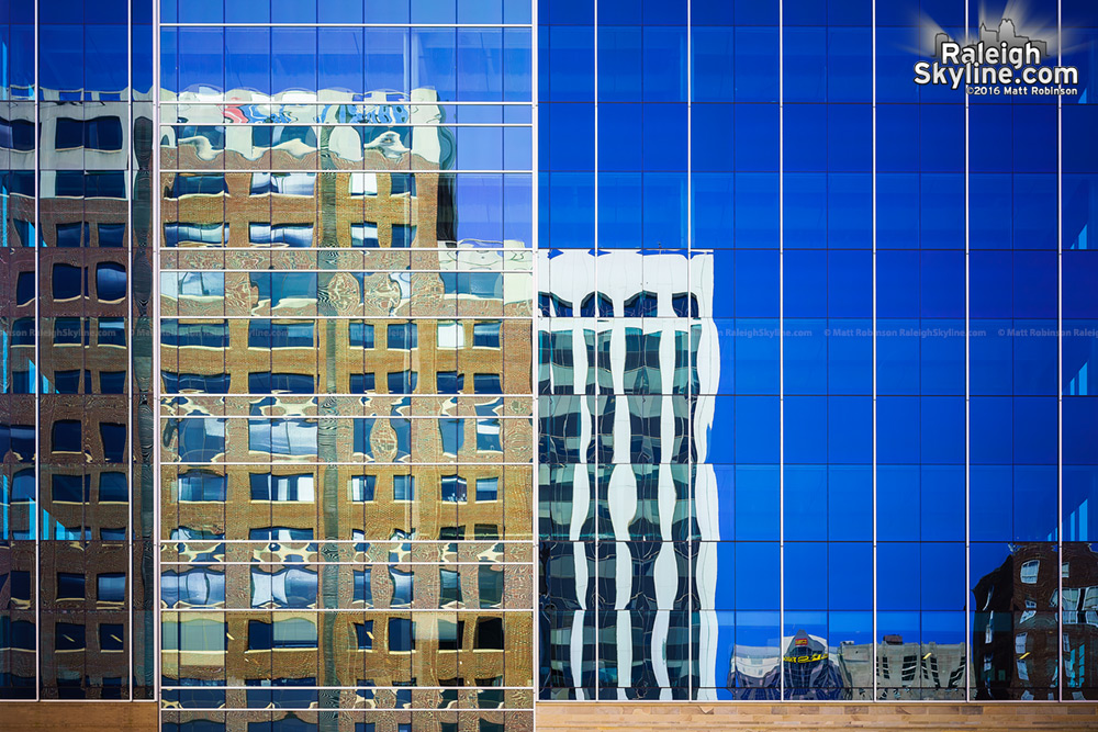 Downtown Buildings reflect in Charter Square