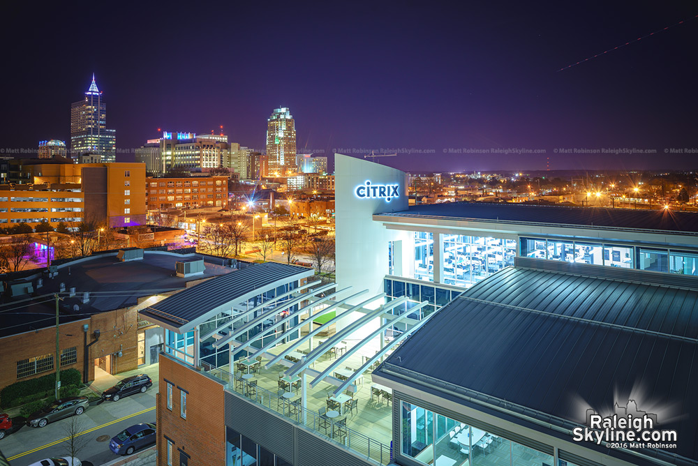 Citrix Sign with Downtown Raleigh at night
