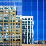 Downtown Buildings reflect in Charter Square