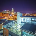 Citrix Sign with Downtown Raleigh at night