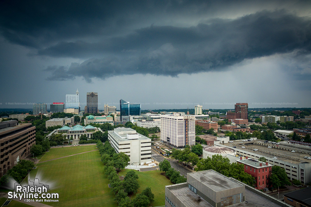 Storm clouds approach downtown Raleigh from Halifax Mall